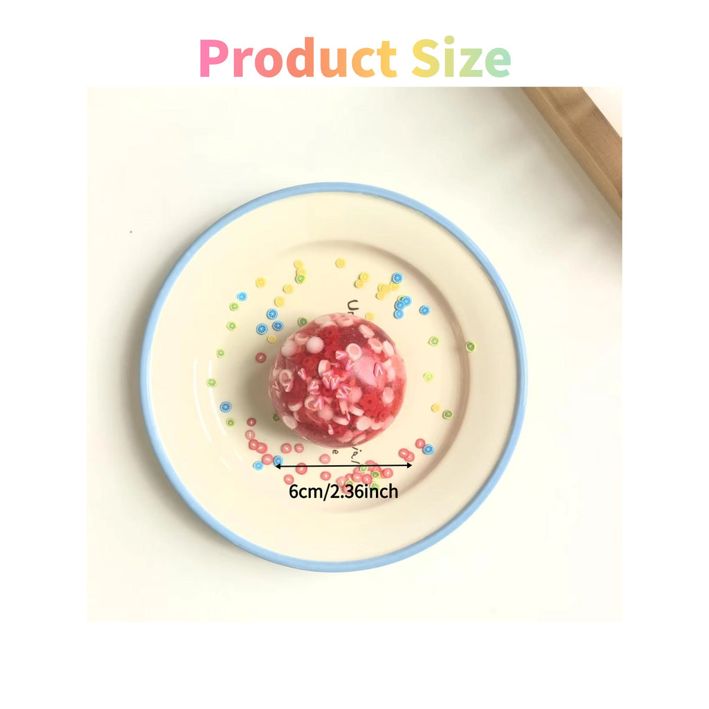 Strawberry Mochi Bloom stress ball size comparison - 6cm diameter on plate