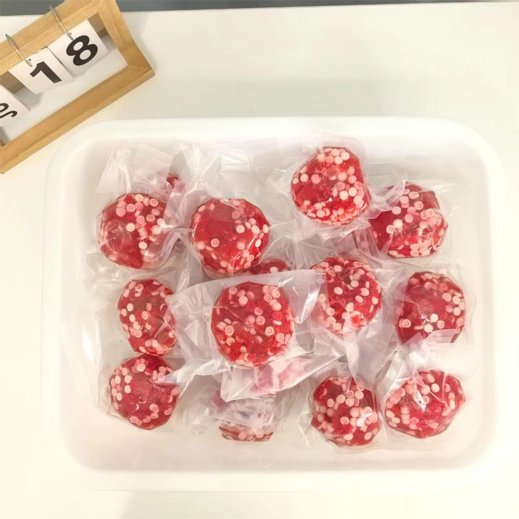 Multiple Strawberry Mochi Bloom stress balls packaged