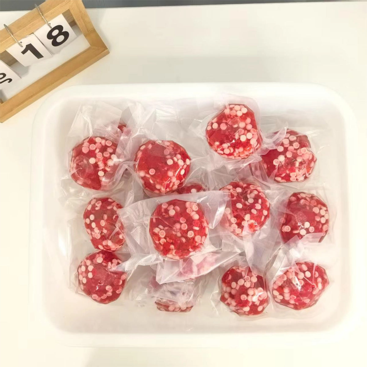 Multiple Strawberry Mochi Bloom stress balls packaged
